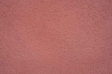 Red concrete plastered wall