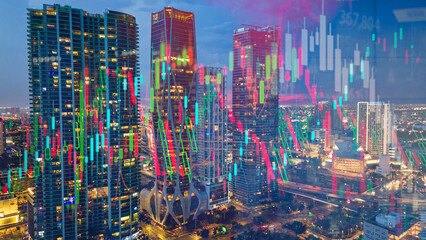 modern skyline cityscape at night with stock market chart candle stick trend 