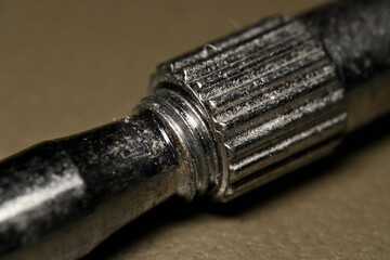 Fototapeta premium Metal screw into nut