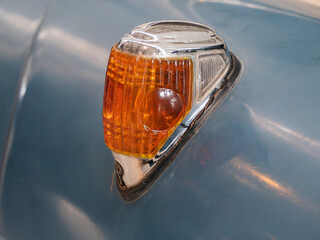 Vintage Car's Amber Turn Signal Close-Up