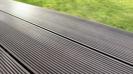 Outdoor plastic composite brown floor. Renovation terrace