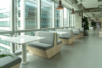 Interior of modern empty office building.Open ceiling design.Equipped with automatic lifting table and LCD screen.