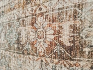 Close up photo of handmade wool Persian carpet. Very beautiful textile design and nice motif.	