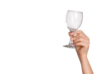 female hand holding an empty glass on an empty background.