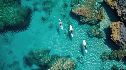 A mesmerizing aerial view of two kayakers gliding through the electric blue waters of the ocean, surrounded by marine life and underwater landscape AIG50
