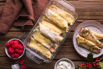 Crepes with cottage cheese , homemade traditional Ukrainian dish nalysnyky