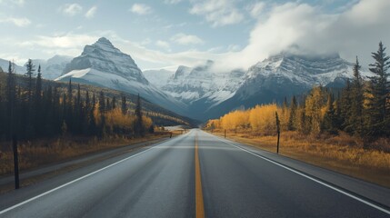Road leading towards a majestic mountain range