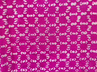 Intricate geometric digital print in off white on pink silk fabric