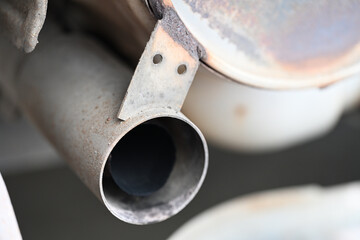From Rust to Ruin: A Detailed Look at a Rusty Exhaust System: High-Quality Shot of Rusted Exhaust...