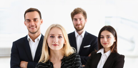 Group of smiling people stand in office looking in camera portrait. White collar power mediation solution project creative advisor participation profession train bank lawyer client visit concept - obrazy, fototapety, plakaty