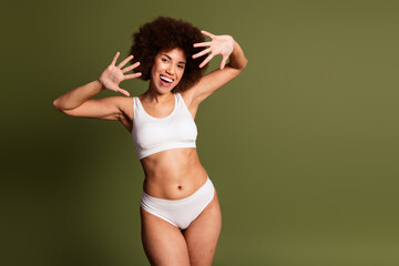 No filter photo of funky shocked lady underwear lingerie enjoying women rights empty space isolated khaki color background