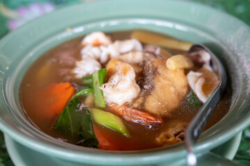 Tom yum, Thai Seafood spicy soup in a bowl.