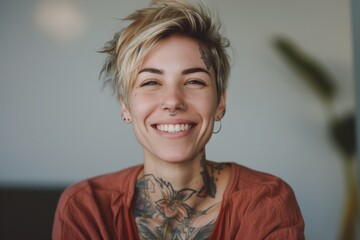 Smiling tattooed woman with nose piercing