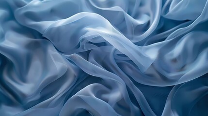 Colorful background of flowing blue fabric. Smooth and soft.