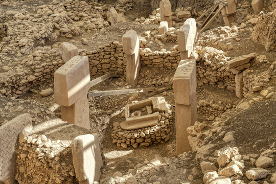Gobekli Tepe neolithic archaeological site dating from 10 millennium BC, Large circular structures with massive stone pillars, Potbelly Hill, Sanliurfa, Turkey