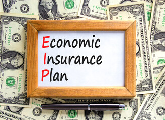EIP economic insurance plan symbol. Concept words EIP economic insurance plan on beautiful wooden...