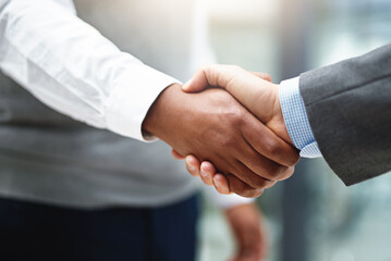 Man, partner and handshake for agreement in office for success for promotion with collaboration by...