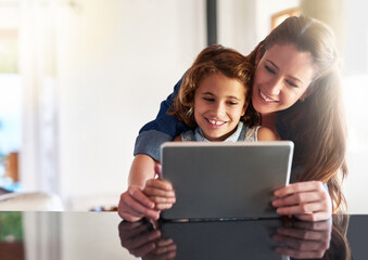 Mother, child and tablet in apartment for elearning, education and connection in family home. Mom,...