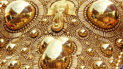 Closeup of golden caparison, the decoration of the elephants participating in the temple festival procession in Kerala, India