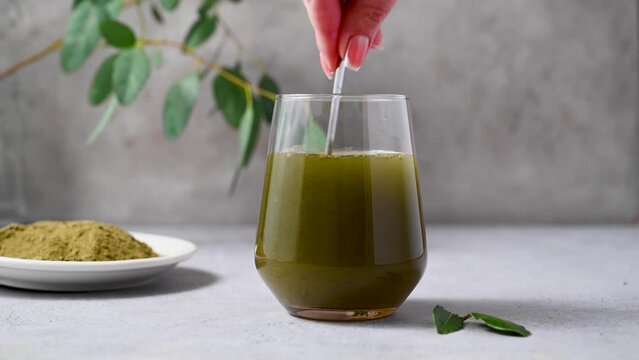 Moringa Matcha Wheatgrass Green Powder drink. Food supplement, healthy food lifesyle