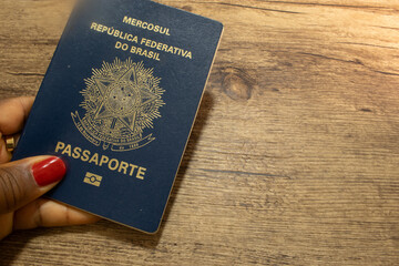 LAURO DE FREITAS, BRAZIL - April 26, 2024 : Brazilian passport on wooden table