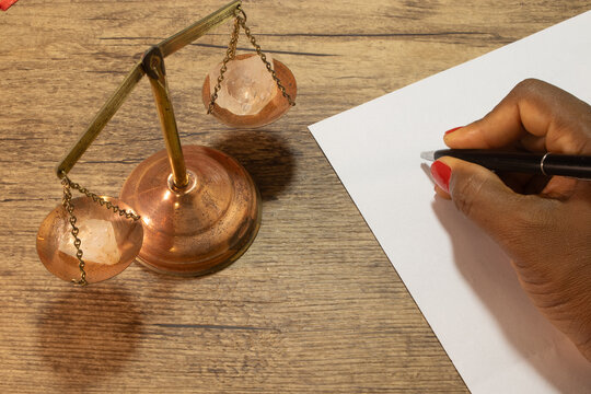scales of justice peto of one hand writing