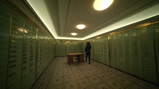 Businesswoman Entering Bank Safe Vault Room Storing Silver Bullion Deposit
