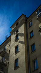 The facade of the building with a view of the sky