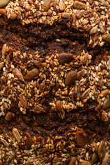 Rich Seeded Rye Bread Close-up: A Symphony of Textures and Flavors