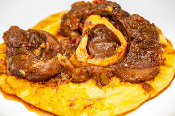 Traditional rustic recipe for ossobuco with polenta