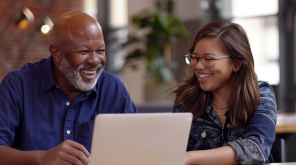 Joyful Multigenerational Colleagues with Laptop