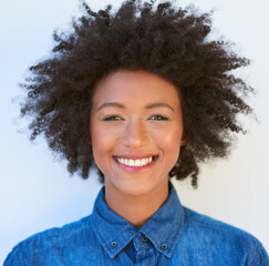 Woman, portrait and afro with smile in studio on white background with confidence, hair care or...