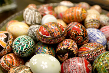 Traditional hand made painted Easter eggs presented at a fair of popular traditions. This eggs are...