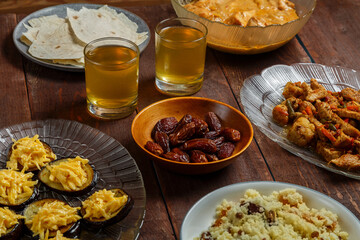 set table meat bread couscous uzvar for a meal holiday of sacrifice Kurban Bayram