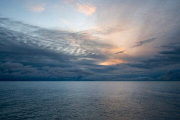 View of the Black Sea on the coast of Sochi against the sunset sky, Sochi, Krasnodar Krai, Russia
