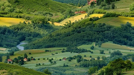 Obraz premium Amazing view of a green valley with a river running through it.