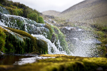 Splashing water of waterfall on Faroe Islands
