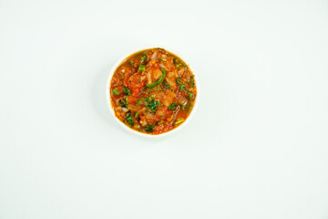 Classic homemade tomato sauce. Tomato chatni. Tomato sauce with onion, coriander and spices                      