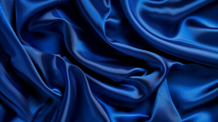 Obraz premium Silky satin fabric in a royal blue shade brings a smooth and luxurious texture to your background.