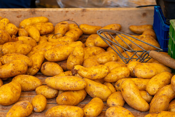 harvested potatoes for sale in a box