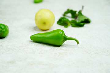 Green Chilli with lemon and mint leaves