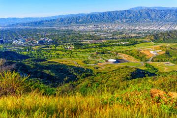 Fototapeta na wymiar Tranquil Overlook: Forest Lawn Memorial Park from the Hill