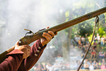 Firing a medieval musket at a demonstration
