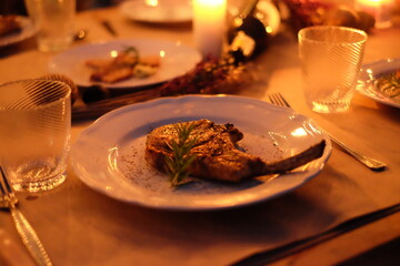 christmas table setting with candle