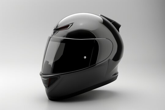 A black motorcycle helmet on a plain white background. Perfect for motorcycle safety or sports gear concepts