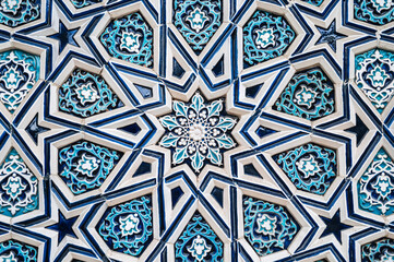 ceramic tile Uzbek mosaic with traditional oriental Arabic Islamic pattern decorated with blue and...