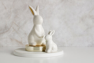 festive Easter background. Easter bunny figurines close-up on the table. copy space.