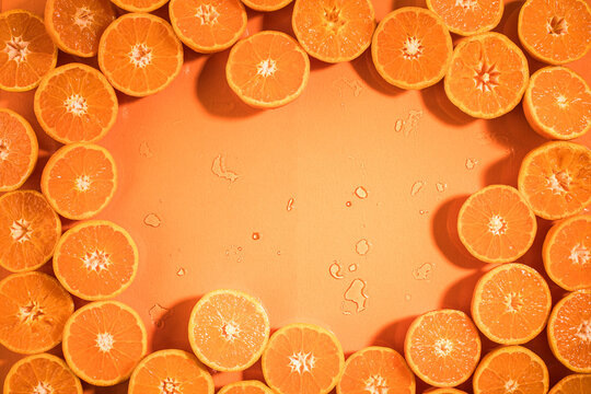 Close up of cut tangerine halves
