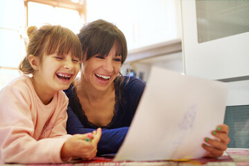 Happy mother, daughter and drawing with paper for fun coloring activity, bonding or homework. Mom...