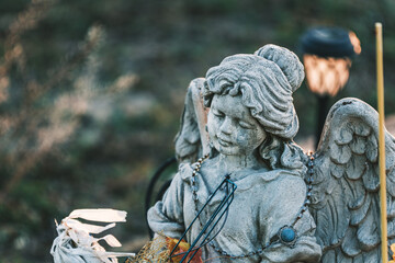 concrete angel statue at a cemetary